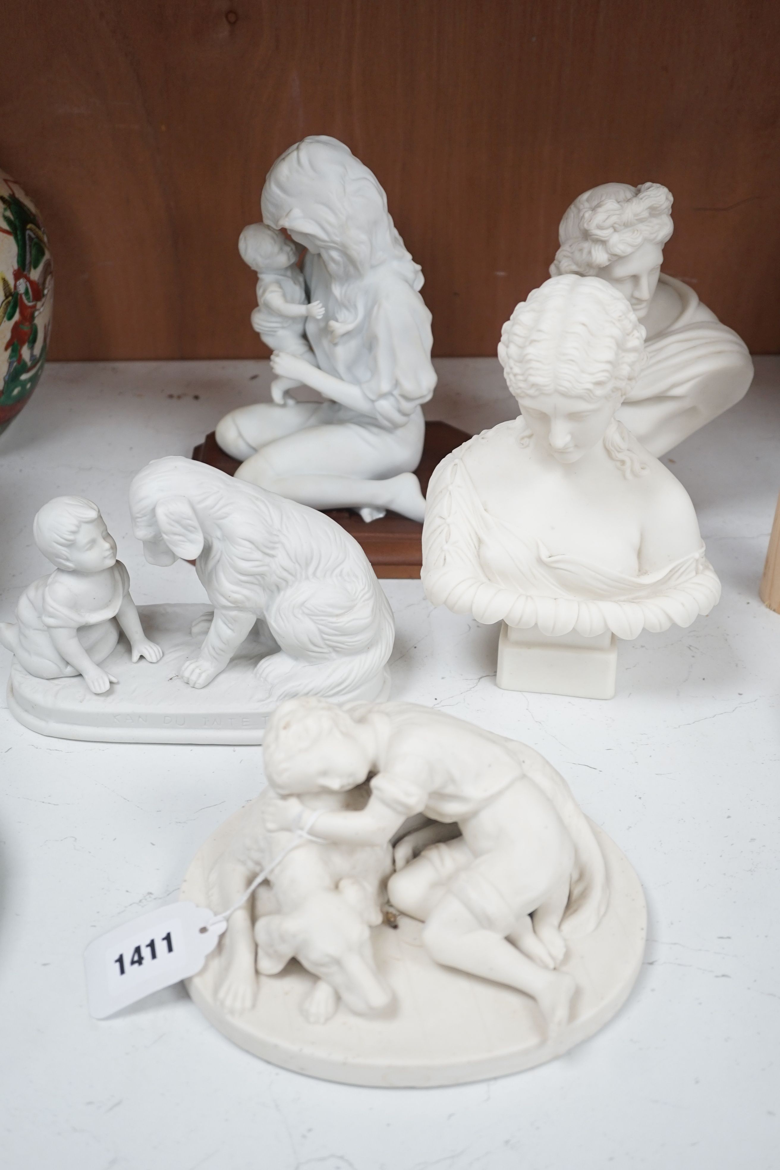 Three parian classical busts and three Parian figure groups, including Gustavsberg, tallest mother and child on wooden stand, 22cms high.